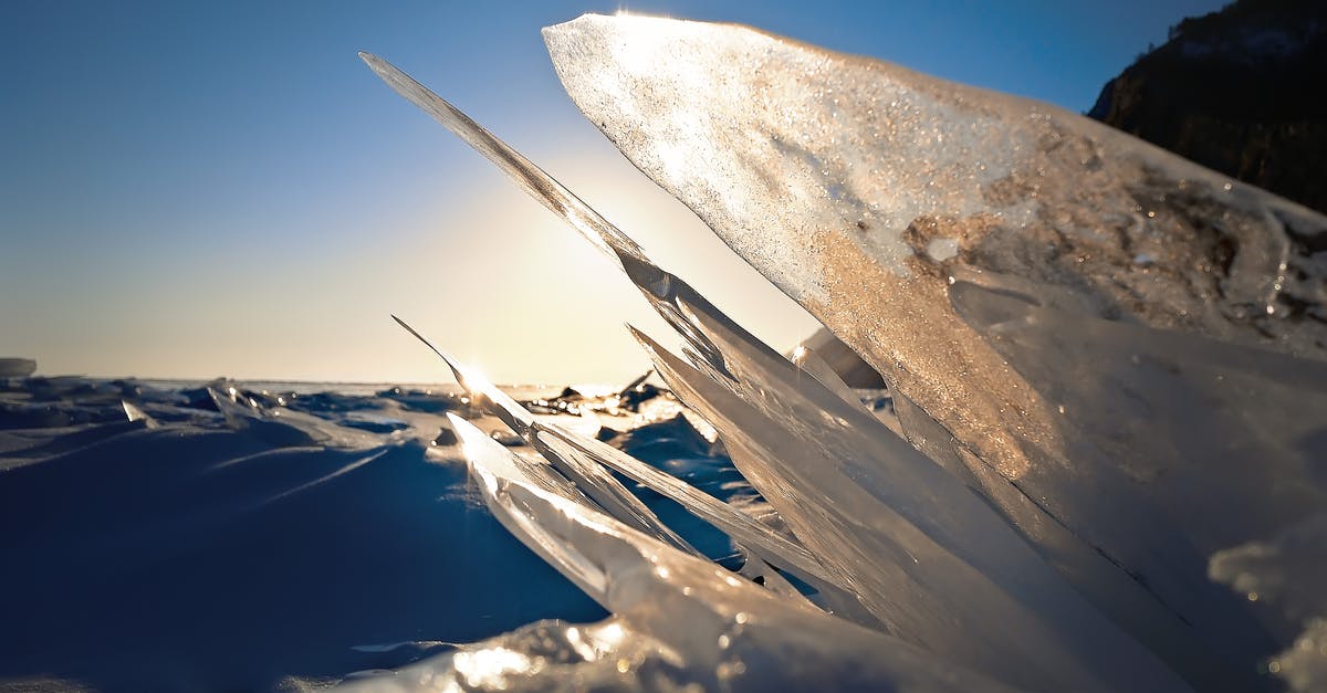 How do I separate my melted rock candies? - Closeup Photography of Frozen Water on Sand