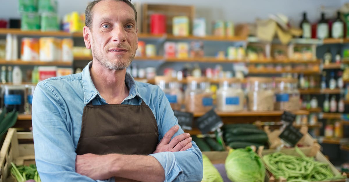 How do I store marshmallows? - Man in Blue Long Sleeve Shirt Holding Green Vegetable