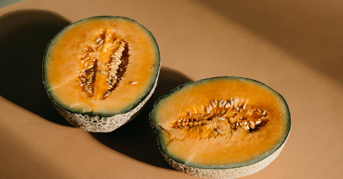How do I tell if a cantaloupe is ripe? - Sliced Melon on a Flat Surface