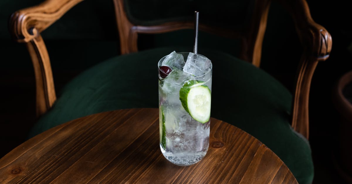 How do I thicken Advocaat without evaporating any alcohol? - Clear Drinking Glass With Ice and Green Liquid on Brown Wooden Table