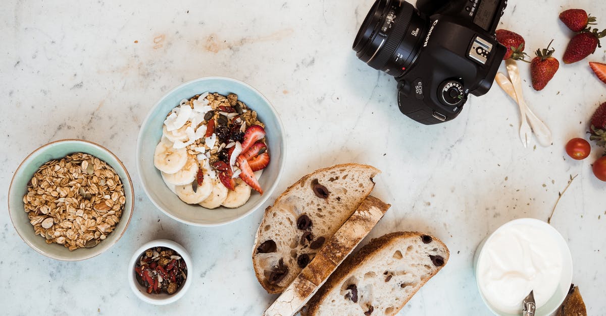 how do I toast oats so that they are crispy? - Black Dslr Camera on White Surface