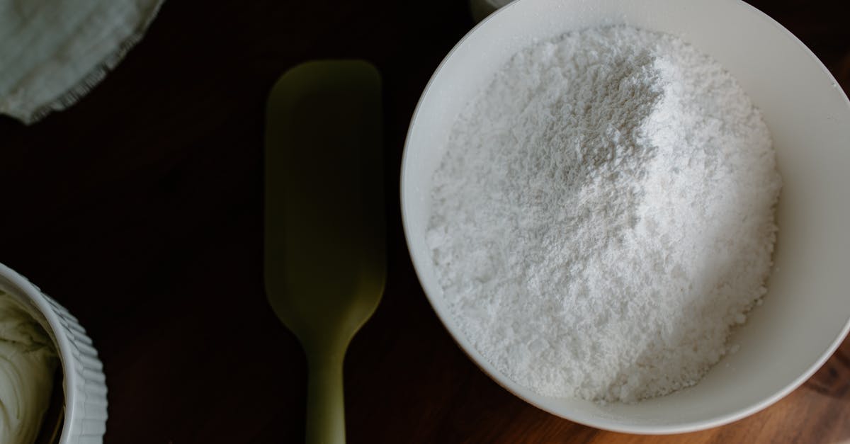 How do the ingredients in baking powder work? - Powder Flour on White Ceramic Bowl