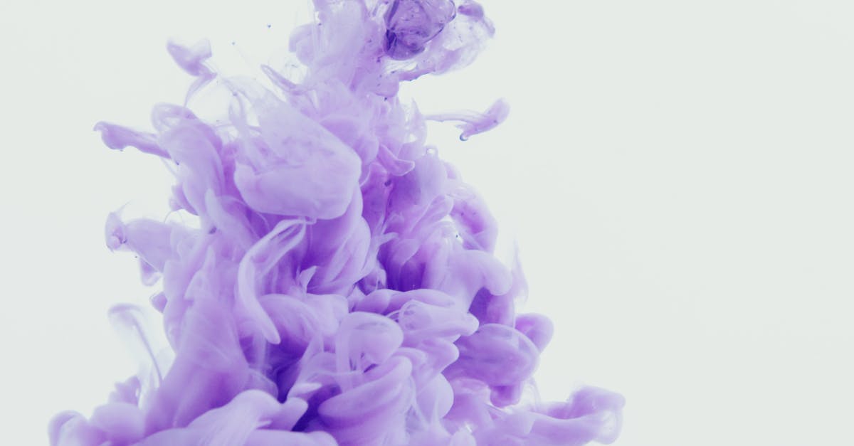 How do these flavors of liquid smoke differ? - Purple Opaque Smoke on White Background