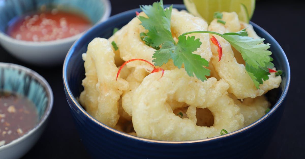 How do you cook calamari / squid and avoid making it tough? - Calamari on Bowl with Parsley Garnish