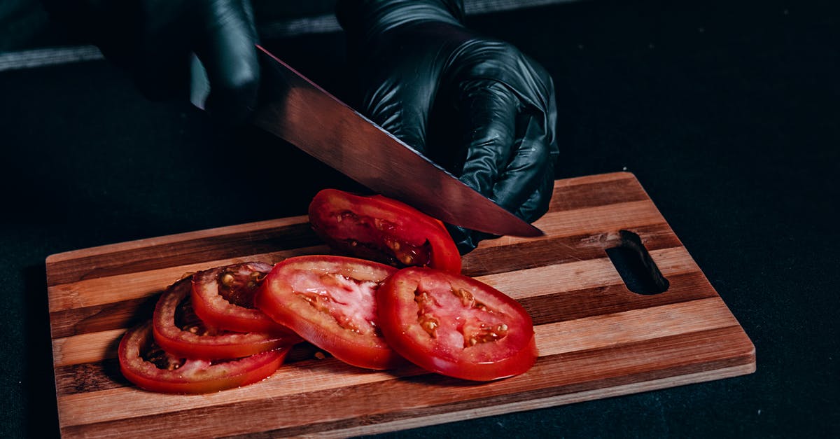 How do you funnel food off a cutting board? - Red Bell Pepper on Brown Wooden Chopping Board