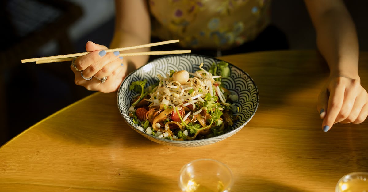 How do you make cheap asian instant noodles without noodles? - Person Eating Noodles