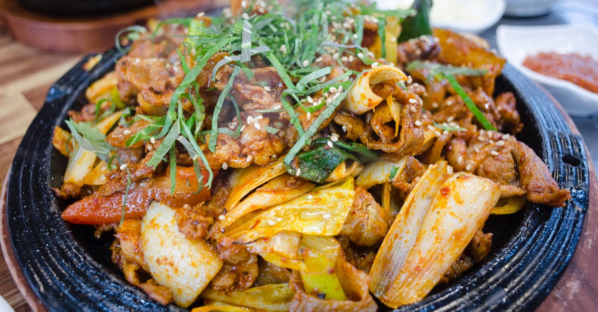 How do you make pork rinds? - Cooked Food on Blue Ceramic Bowl