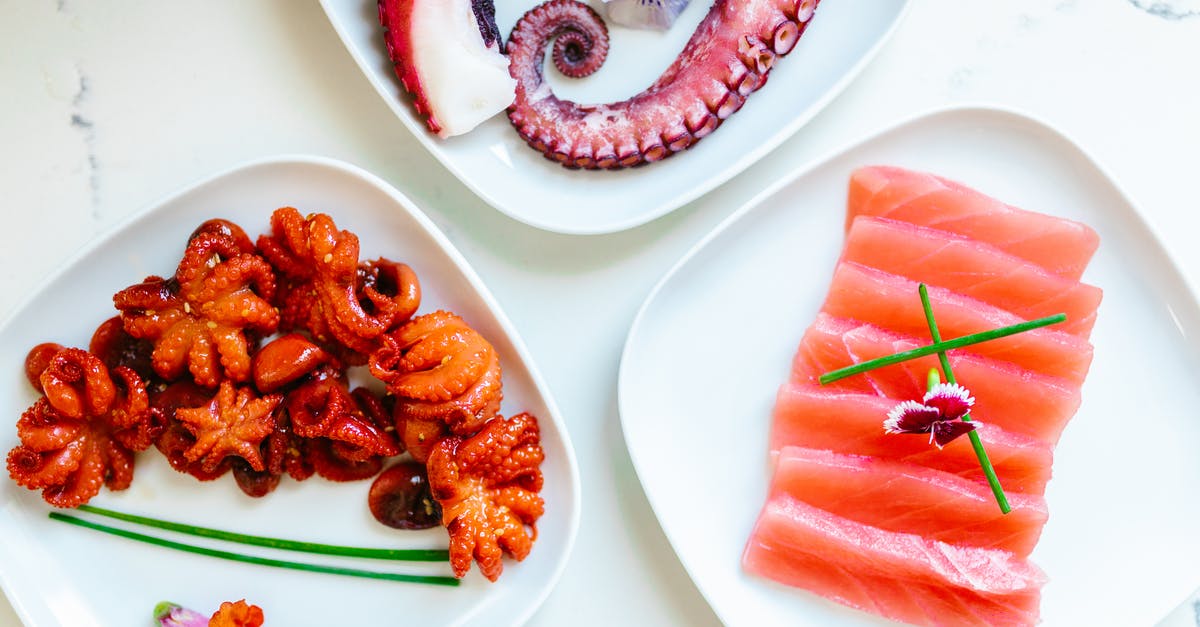 How do you make sure your salmon is cooked through? - Salmon and Octopus and Tentacles on Plates