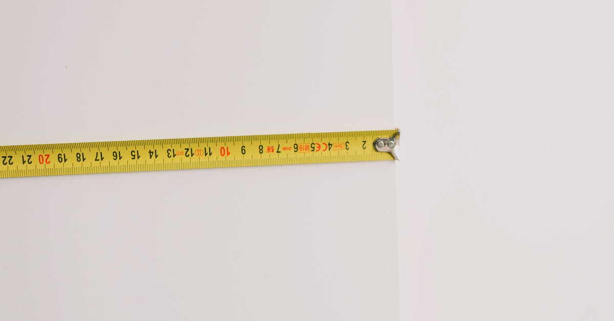 How do you prepare Brie? - Measuring tape on empty white background