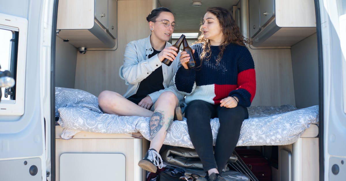 How do you properly toast rice? - Photo of Women Doing a Toast with Their Bottles of Beer