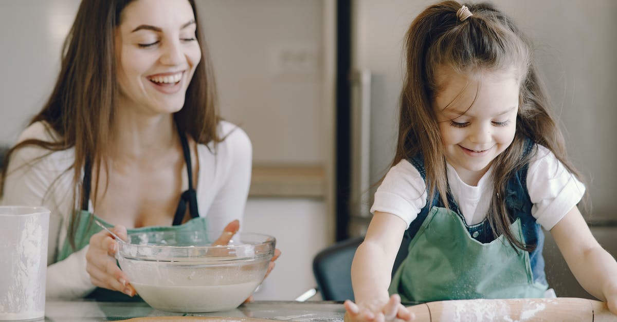 How does altering the fat-to-flour ratio affect the pastry? - Photo of Girl Using Rolling Pin