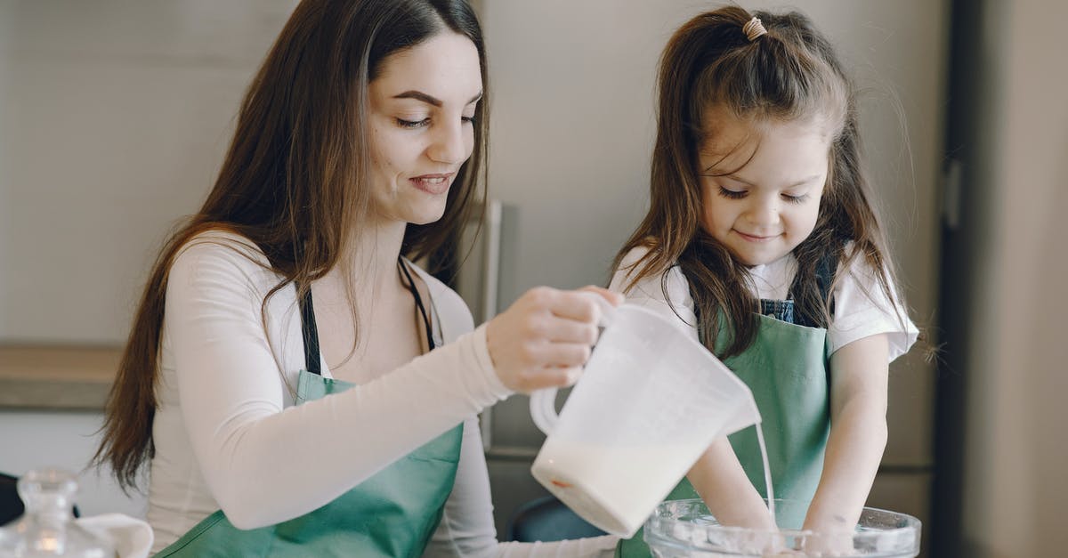 How does altering the fat-to-flour ratio affect the pastry? - Photo of Woman and Child Baking