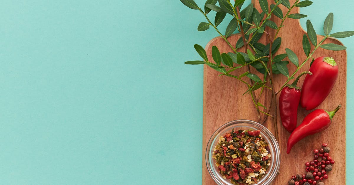 How does dried cilantro relate to fresh? - Green Plant on Brown Wooden Table