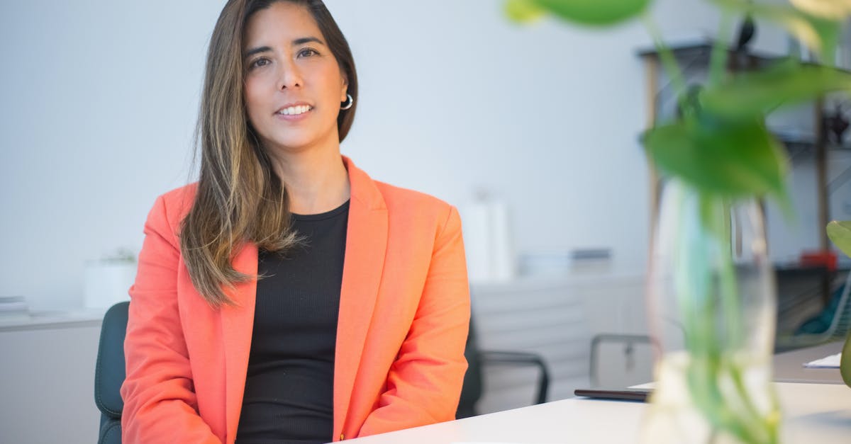 How does lentils' nutritional profile change in germinating lentils in water? - Woman in Orange Blazer Sitting Behind Her Desk