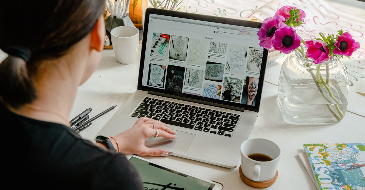 How does one begin to create salsa? - Photo Of Person Using Laptop For Graphic Designs 