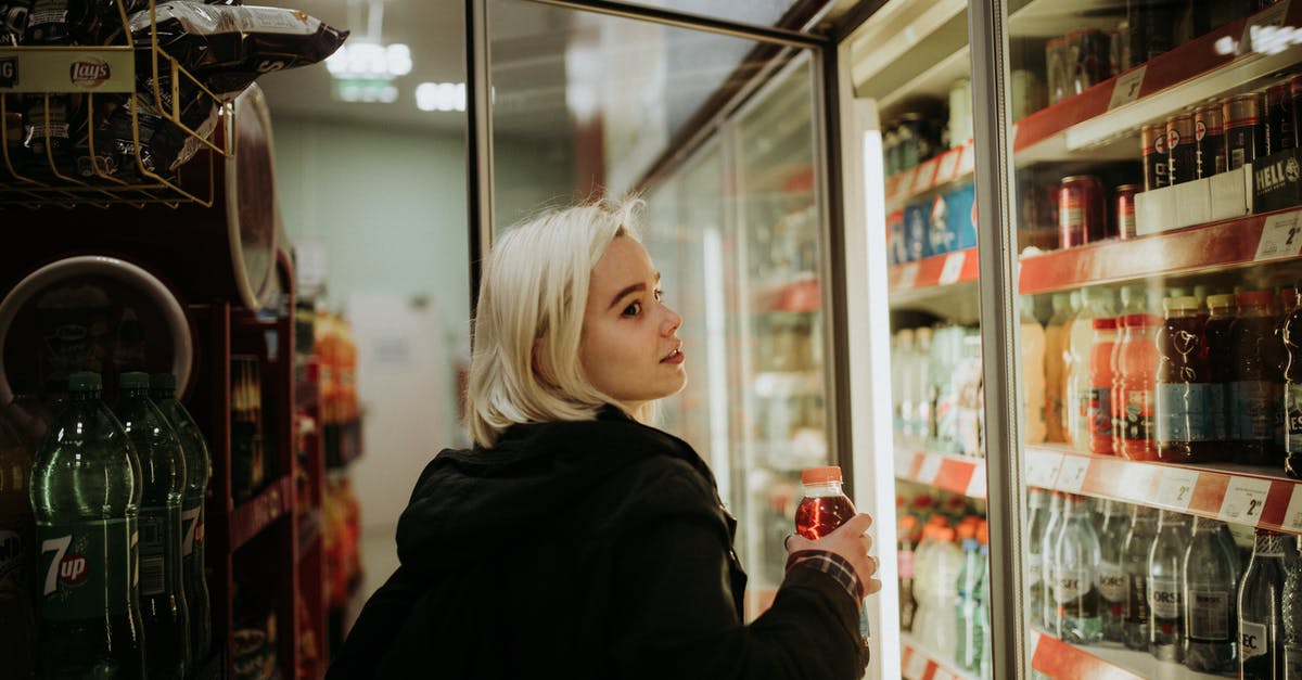 How does the meat in Weisswurst get so white? - Woman Buying a Drink