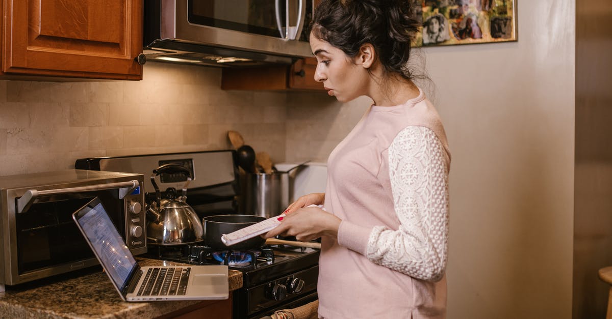 how does turbo chef oven work and technology in it? - Woman in White Long Sleeve Shirt Standing in Front of Kitchen Counter