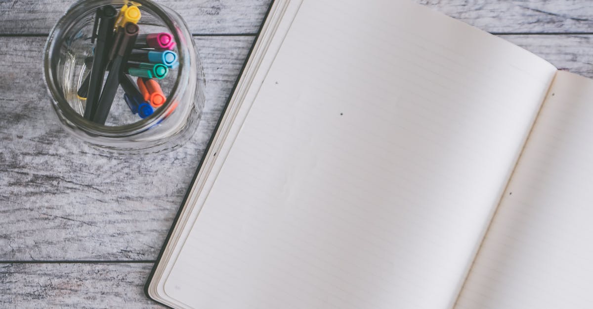 How does vacuum sealing something in a mason jar help? - Photo of Blank Note Book Near Clear Jar