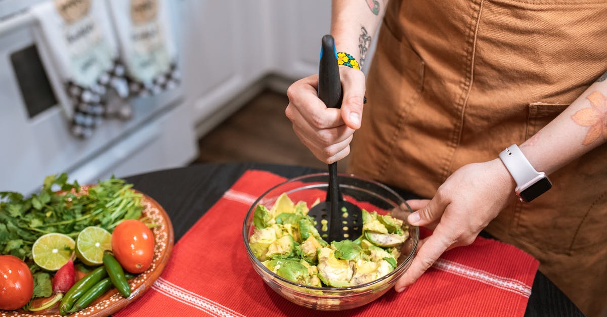 How finely chopped should vegetables be when making stock? - A Person Making Guacamole