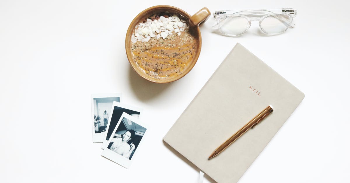 How important is isolating food in a fridge? - Brown Ceramic Cup Beside Notebook and Pen