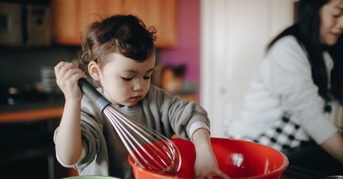 How is baby bok choy cooked in Shanghai? - A Child Baking In The Kitchen With Her Mom