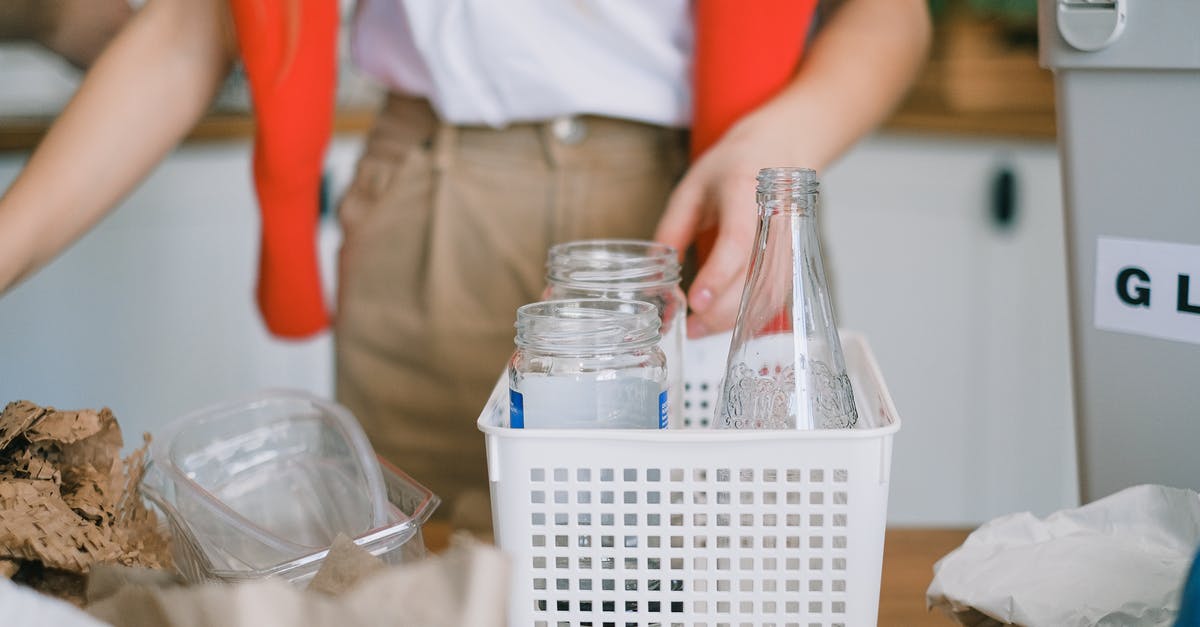 how is flaxseed processed for consumption - Woman sorting out rubbish into containers