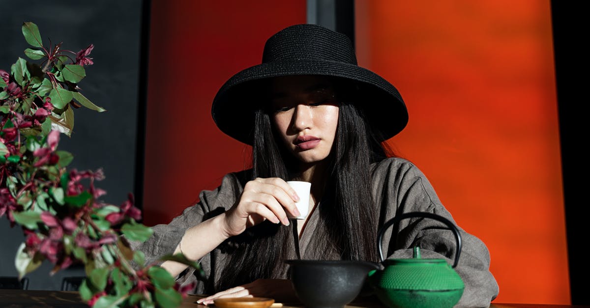 How is jin jun mei (a Chinese tea) made? - A Woman Holding a Teacup