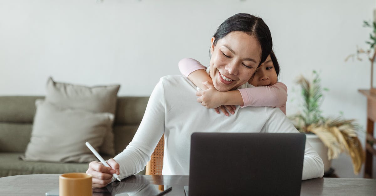 How is Kiwifruit used to tenderize Meat? - Happy mother working from home and little daughter hugging mom