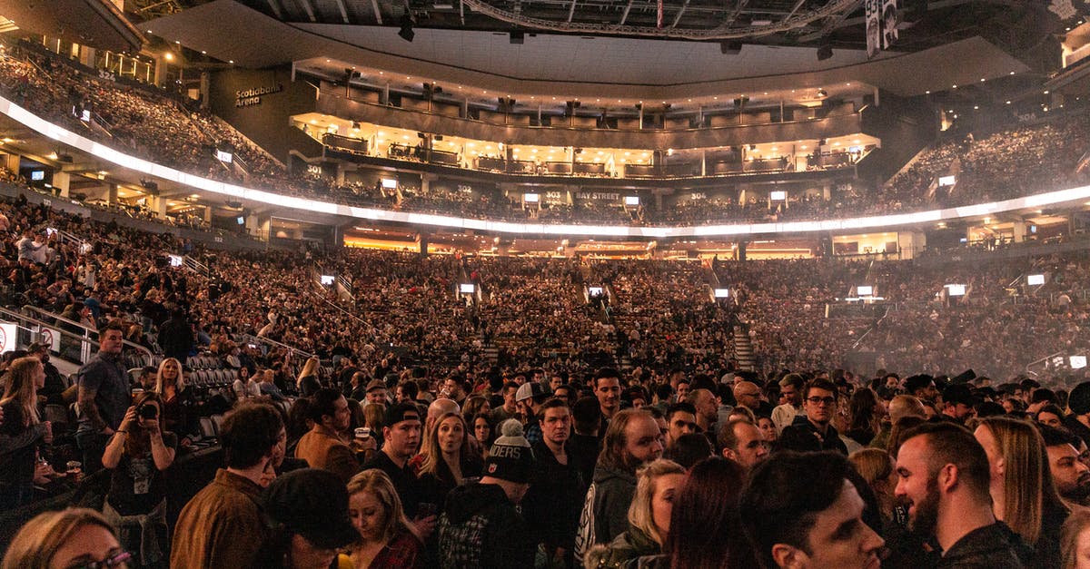 How is mass egg-frying performed? - People on Stadium Event