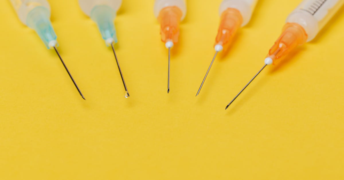 How is pasteurization different from sterilization? - Syringe needles with no cover on yellow background