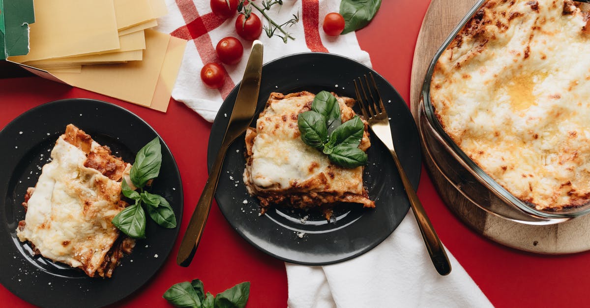 How is this lasagna pasta supposed to be cooked? - Two Servings Of Lasagna On Black Plates