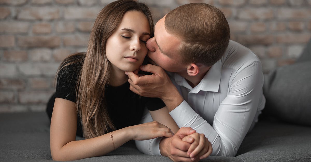 How long can I hold brown rice between boiling and steaming? - Young Man and Woman Holding Hands and Man Kissing Her in Cheek