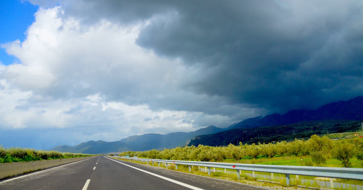 How long can I keep green curry paste? - Photo of Road Near Green Leaf Trees Under Dark Clouds at Daytime