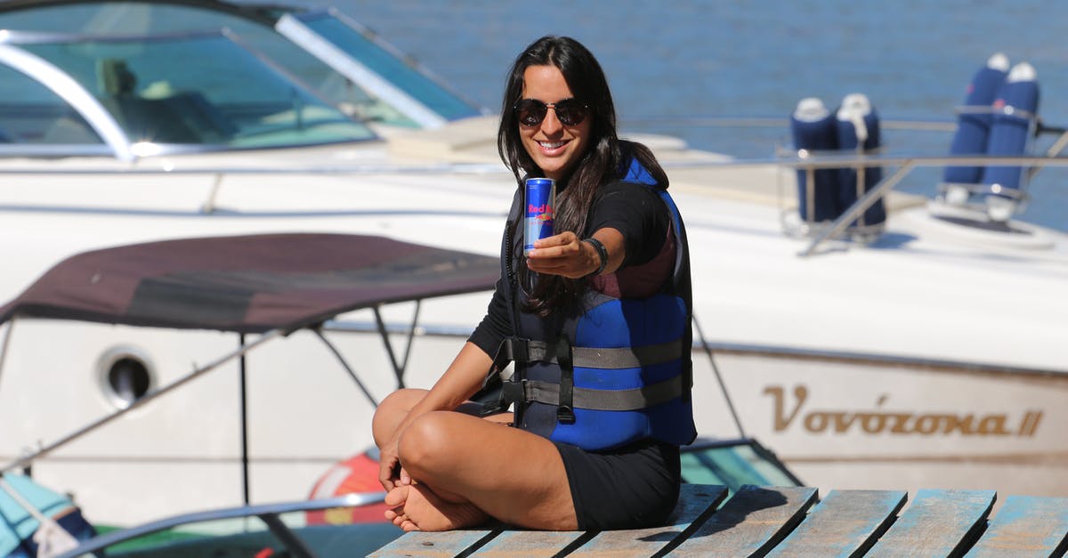 How long can I marinade/brine a tenderloin? - Woman Holding a Can Sitting on a Wooden Deck