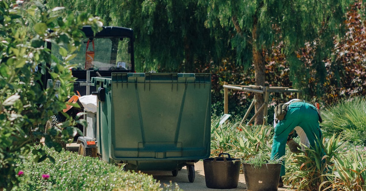 how long can i microwave microwaveable plastic containers for? - Man in Green Pants Near the Garbage Cart