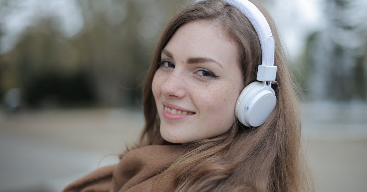 How long does doughnut dough need to chill? What is meant by "chill over night?" - Joyful millennial woman in headphones listening to music in park