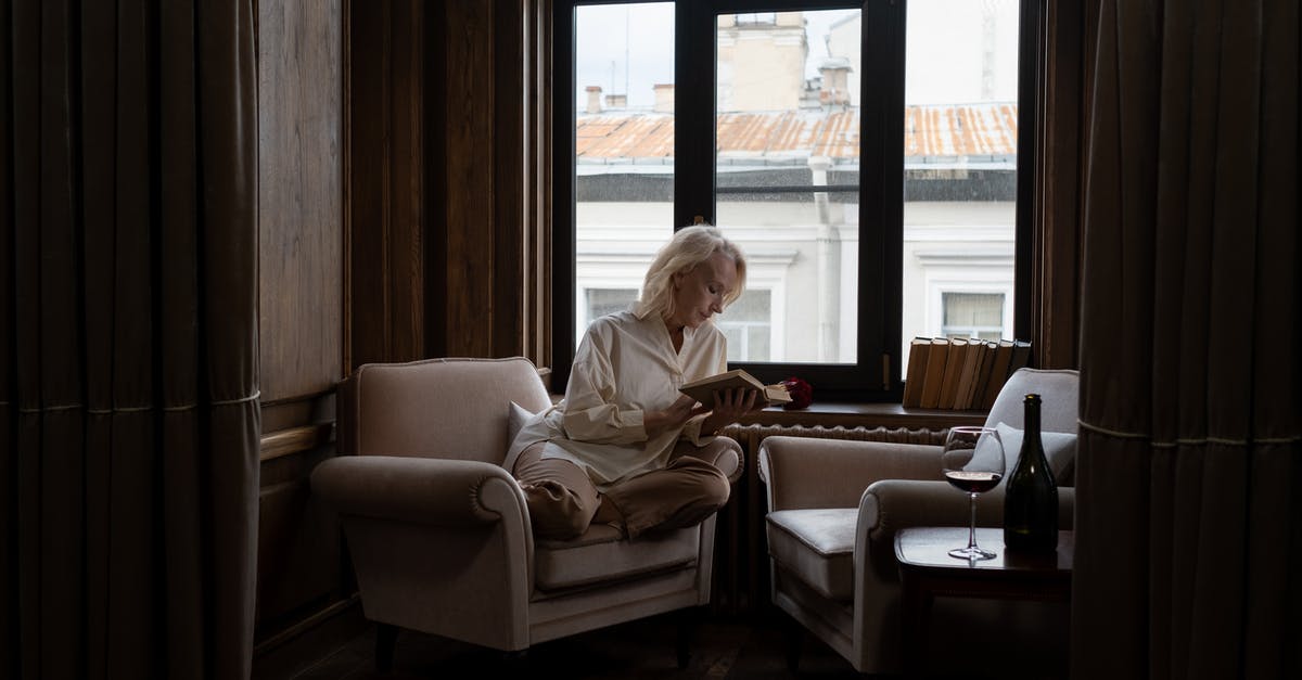 How long does Marsala wine last, after opening? - Elderly Woman Reading Book in Room