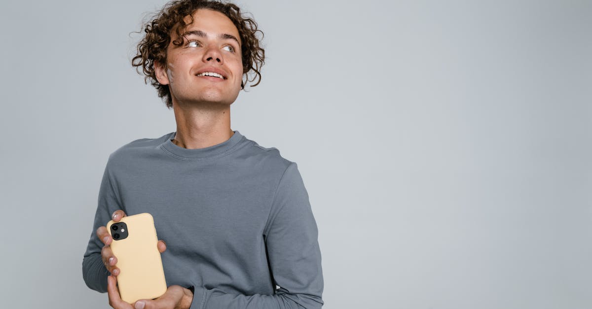 how long is tofu good for? - Man in Gray Crew Neck Long Sleeve Shirt Holding Iphone