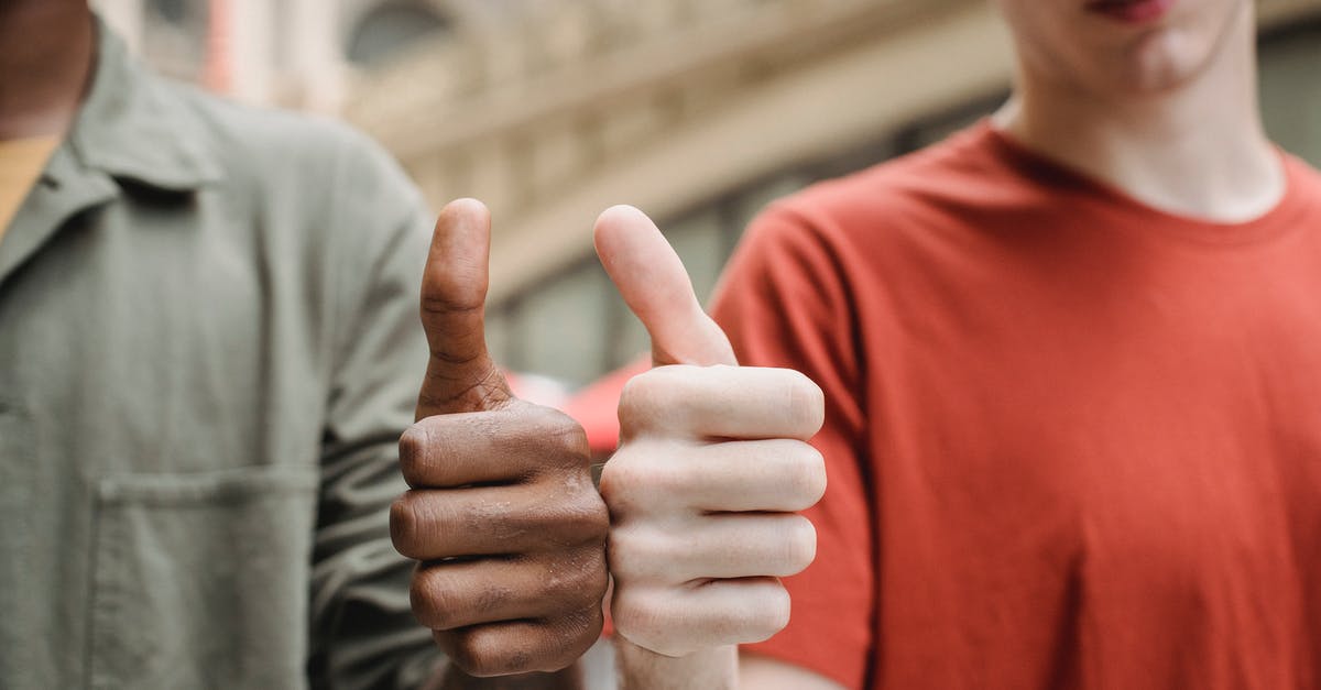 How long is yogurt good after the best by date? [duplicate] - Unrecognizable multiracial guys showing thumbs up gesture