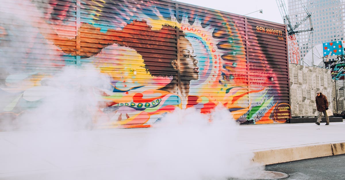 How long should I steam squid and cuttlefish? - Man Walking On Sidewalk With Wall Painting