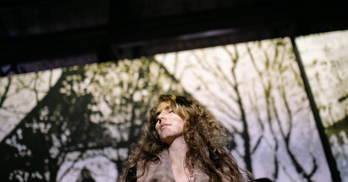 How long will schmaltz last in the freezer? - Woman in Black Jacket Standing Near Green Trees