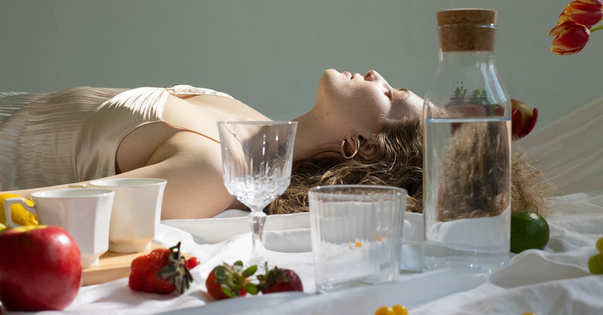 How long will this apple compote keep in the fridge? [duplicate] - Peaceful young woman lying with closed eyes near assorted fruits on blanket