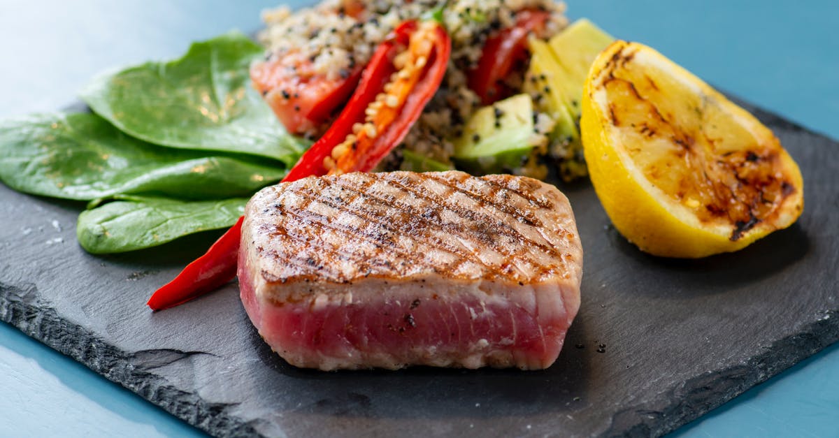 How long will tuna salad stay good refrigerated? - Sliced Meat With Sliced Tomato and Green Vegetable on Blue Chopping Board