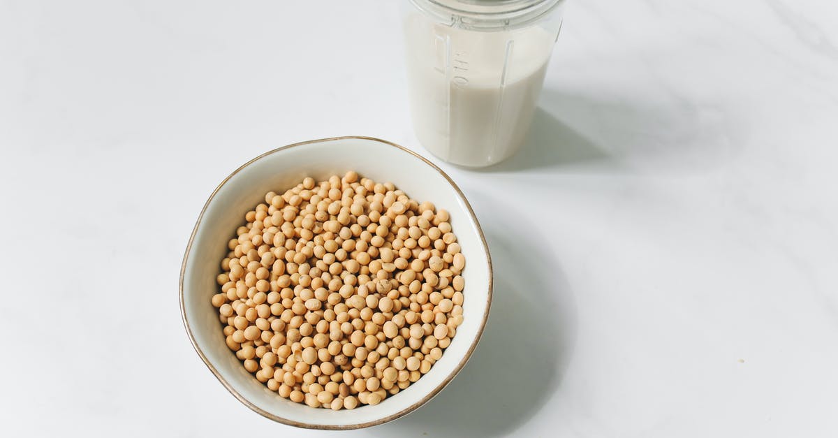 How many grams is "1 can" of beans? - Photo of Soybeans Near Drinking Glass With Soy Milk