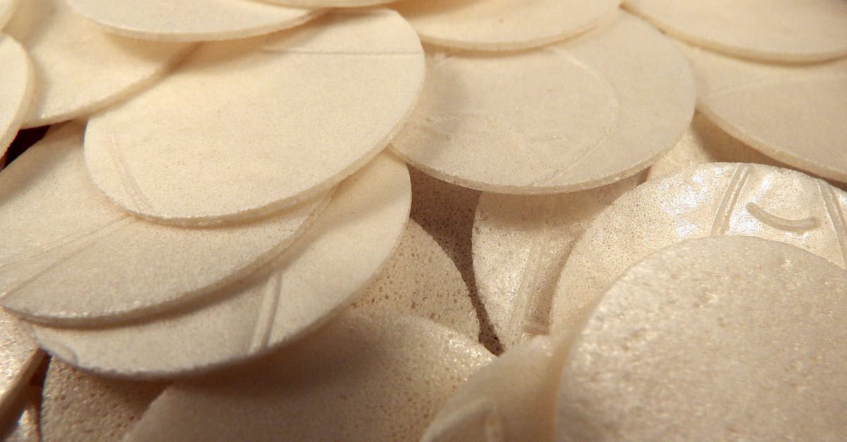 How many risings for bread? - Pile of thin white circles of Sacramental bread