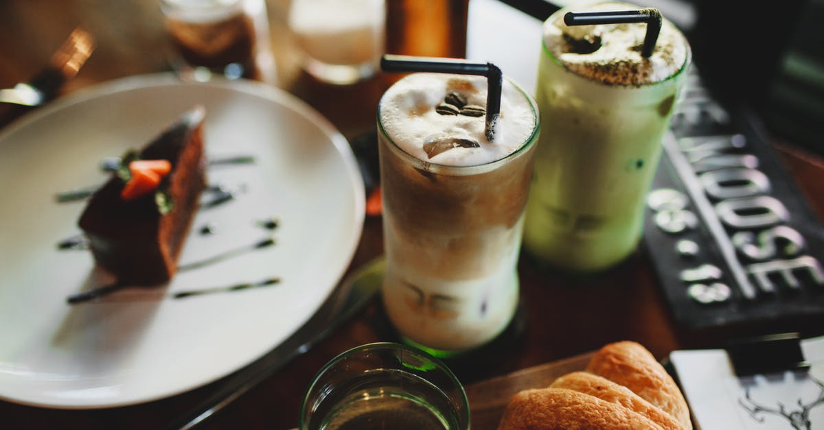 How much caffeine is in matcha powder? - Delicious assorted milkshakes placed on table with chocolate dessert