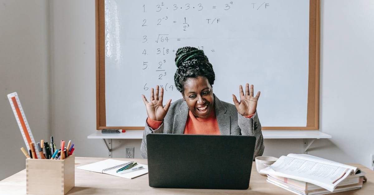 How much experience is needed to work in a restaurant? - Happy black woman using laptop for online work