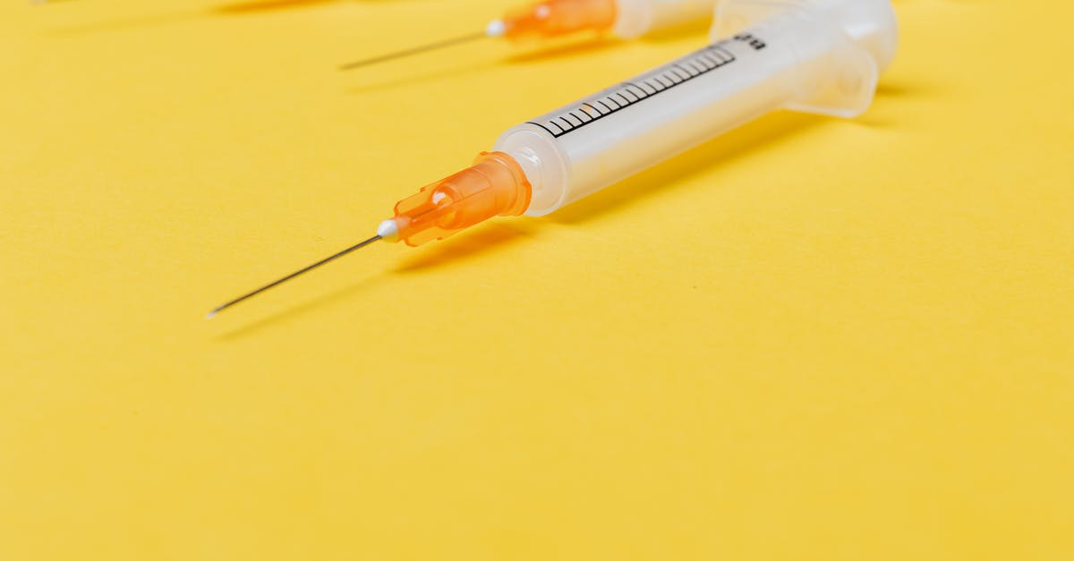 How much oil should you use when stir frying a single portion? - Medical single use disposable syringe without protective cover on needle and with empty barrel placed on bright yellow surface