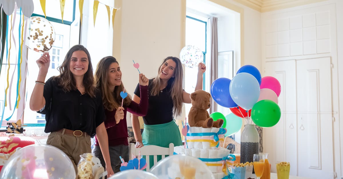 How much Omega-6 does sprat have? - 3 Women Smiling and Standing Beside Table