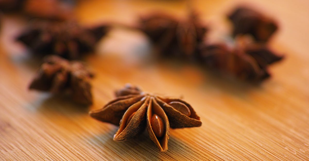 How much star anise should I add to a stew? - Selective Focus Photography of Star Anise on Top of Wooden Surface